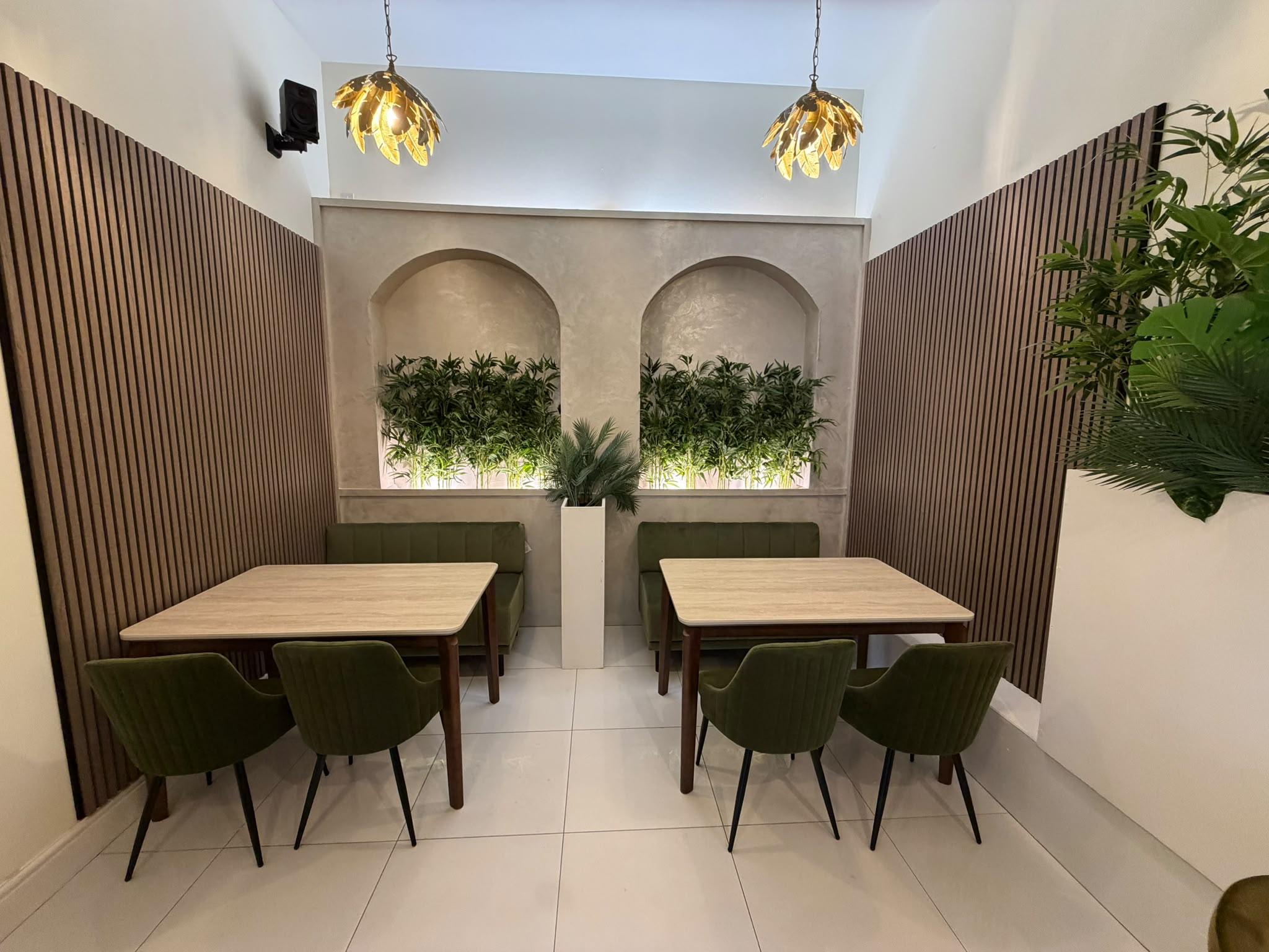 Hills Kitchen green booth seating